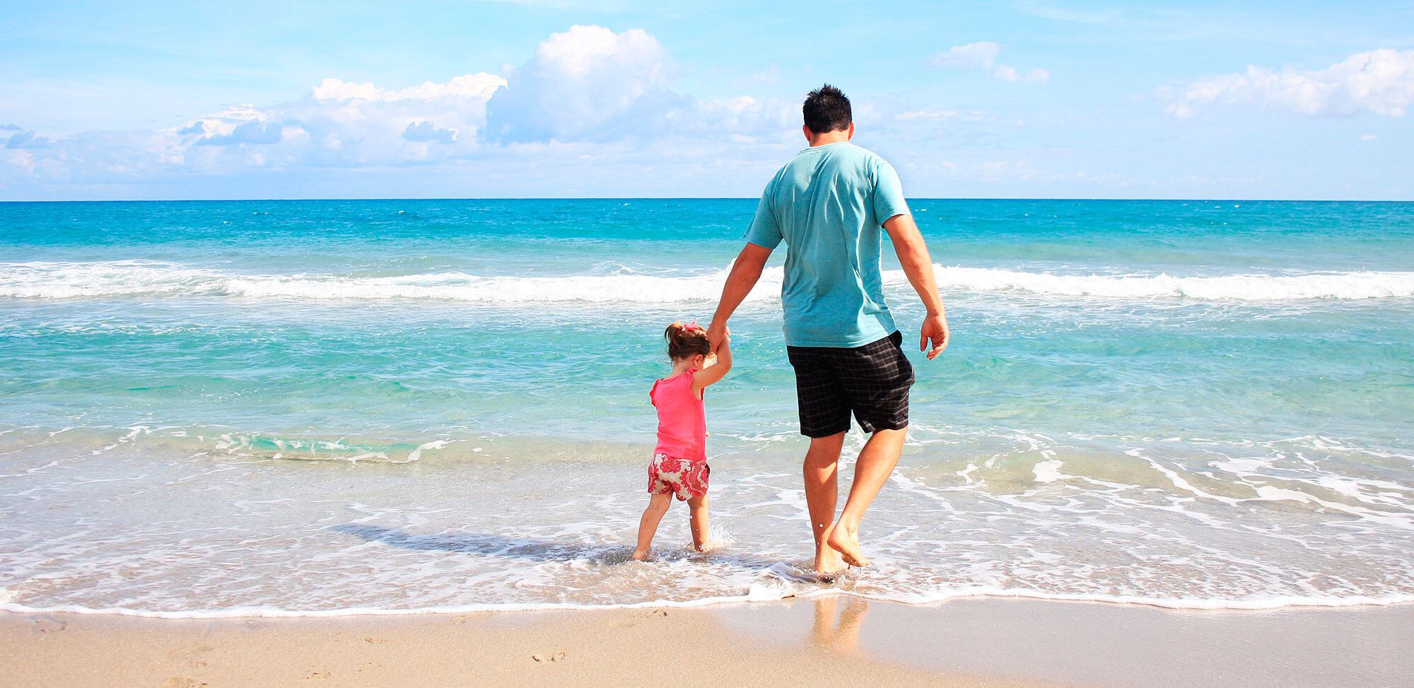 Fotografía padre e hija en la playa